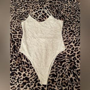 Never worn lace body suit